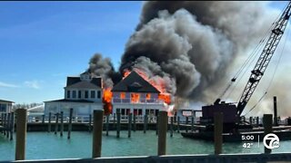 Crews battle massive fire at homes on Harsens Island