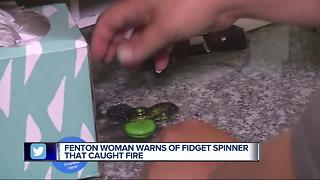 Fenton woman warns of fidget spinner that caught fire