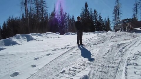 Snowy hike to get firewood up the mountain