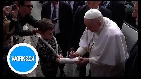 Pope Francis cheerfully greets people after leaving hospital |