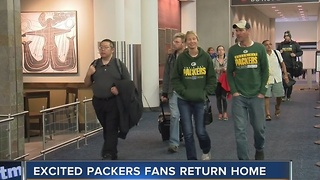 Excited Packers fans return home after Sunday's game