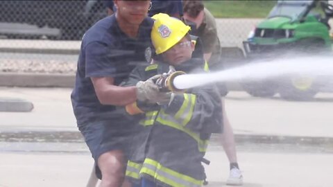 Kids learn how to be firefighters at Denver Fire Department's annual summer camp