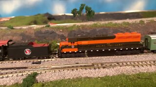 N Scale GReat Northern Excursion train passing through