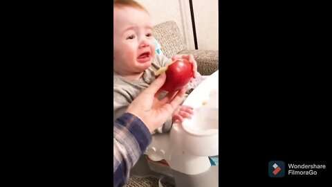 Cute little baby loves his apple...mommy don't touch#baby#love#apple#cry#back#shorts#firstshortvideo