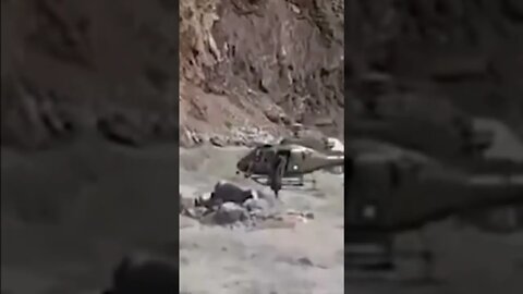 Pakistan floods: Man rescued from a raging river by military helicopter