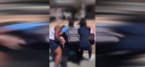 Fight caught on camera at Cram Middle School, adult punches minor