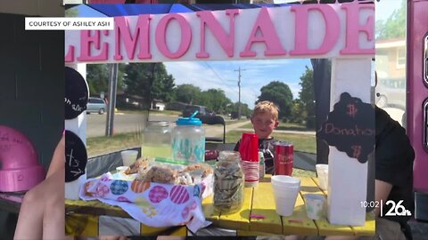 Young boy uses lemonade stand to raise money for charity