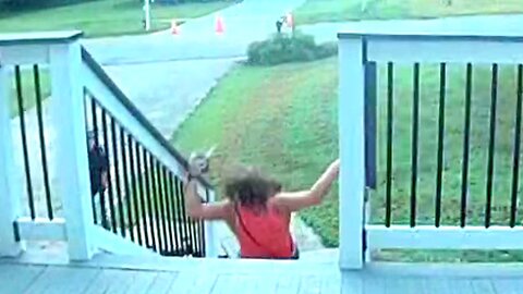 Woman With Flip-Flops on Slips and Falls Down Wet Stairs | Doorbell Camera Video
