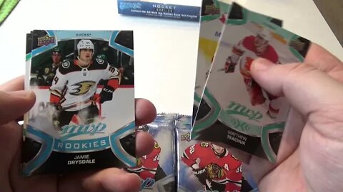 Jay opens a box of Upper Deck MVP hockey 2021-22