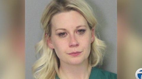 Woman accused drunk driving on train tracks