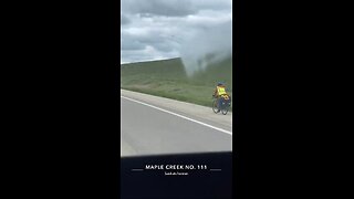 Riding bike on the highway in Saskatchewan