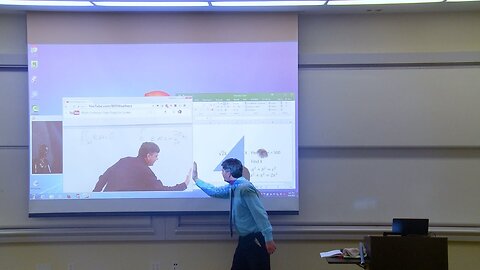 Math professor fixes projector screen (April Fools prank)