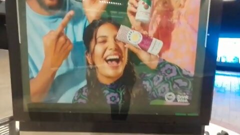 Fruity beer ads in train station have occult elite vibe