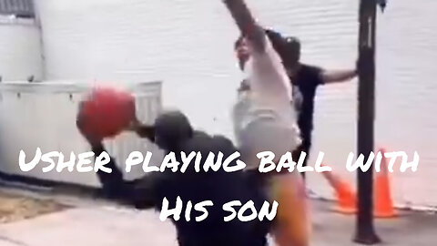 Usher playing ball with his son