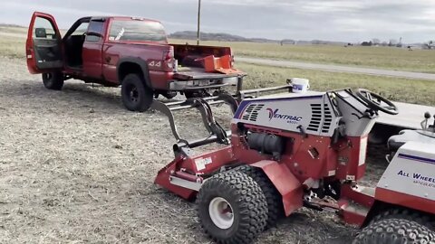 Ventrac 4500Y diesel Using power bucket to rough out a trail.