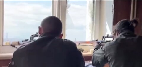 A pair of DPR volunteer snipers, against Ukrainian nationalists in the Azovstal region.