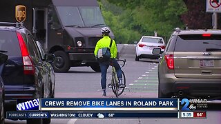 Crews remove bike lanes in Roland Park