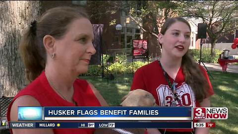Husker flags benefit families in need