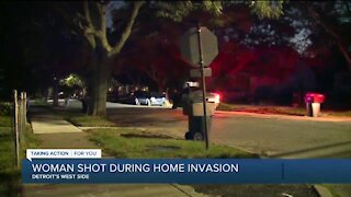 Woman critical after being shot by masked man during home invasion