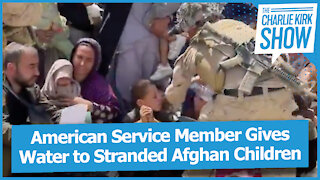 American Service Member Gives Water to Stranded Afghan Children