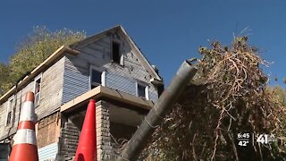 Community helps woman repair home