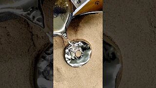 Pouring Molten Metal on Sand