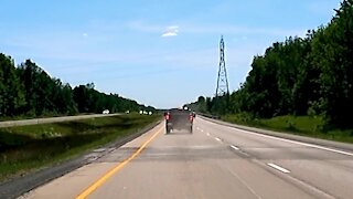 Skillful truck driver maintains control during high speed tire blowout
