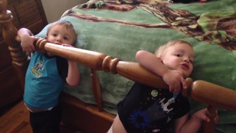 "Twin Boy Tots Get Stuck in A Bed Frame"