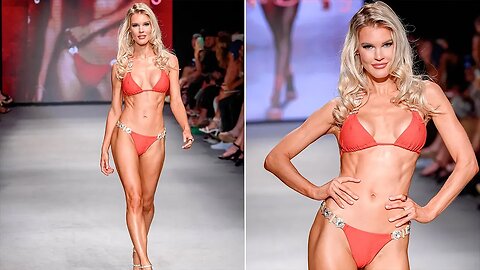 Former Playboy model Joy Corrigan heats up the runway modeling bikinis during Miami’s Paraiso Swim
