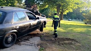 vehicle being towed after it was recovered from the pond