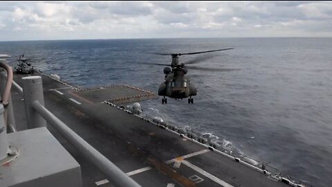 Japanese CH-47J Chinook helicopter landing on Amphibious Assault Ship USS America - LHA 6