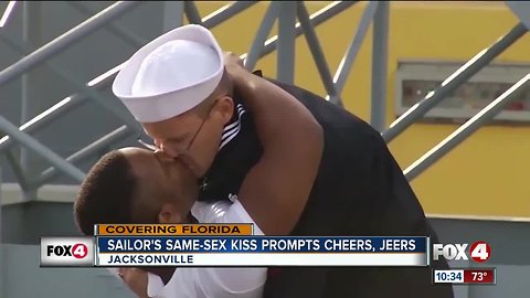 Sailor's same-sex kiss prompts cheers, jeers