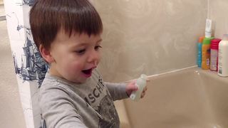 A Tot Boy Gets Very Excited About Taking A Bath