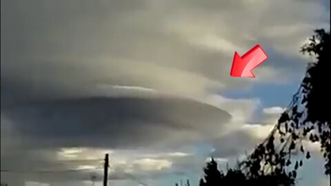 Disc-shaped UFO-like object can be seen in the large cloudy sky [Space]