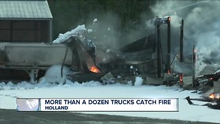 Several fire crews respond to large fire at trucking company in Holland