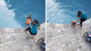 Mom saves kid after jumping in the pool