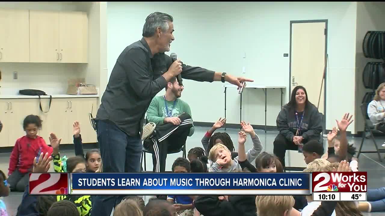 Tim Gonzalez hosts a harmonica clinic for TPS students