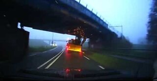 Tractor crashes violently against bridge