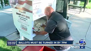 Primary election ballots being dropped off