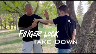 Use a Finger Lock to Take An Attacker to the Ground in Self Defense.