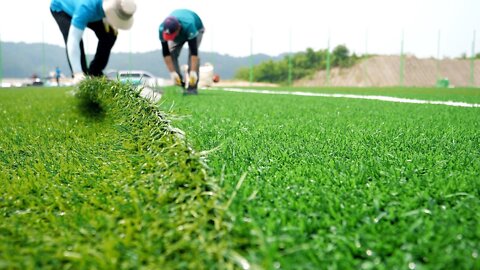 process of making a World Cup soccer field with artificial turf in Korea