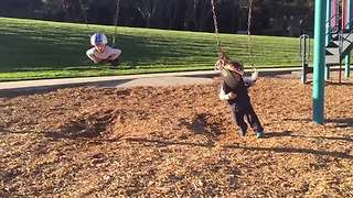 A Little Boy VS A Swing