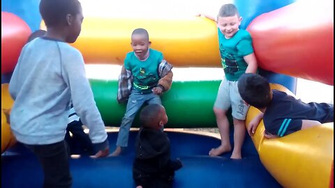Kids Playing on Jumping Castle
