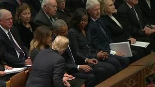 President Trump arrives to Bush funeral, greets Obamas