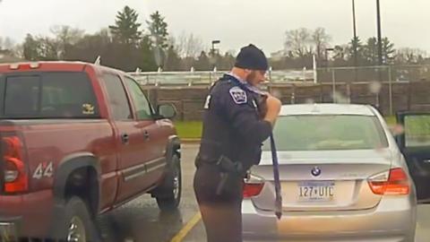 Cop Helps Kid Tie His Tie For School