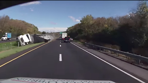 Cars Narrowly Avoid Lethal Crash After Semi Tips Over On Highway