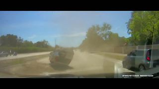 Dash cam video: SUV rolls over to avoid hitting deputy in Fort Myers