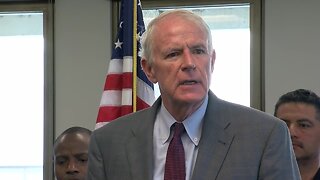 Milwaukee Mayor Tom Barrett reacts to Officer Kou Her's death