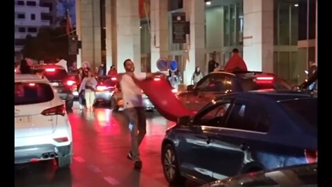 Moroccans celebrated on Thursday after their team qualified for the knockout stages of the World Cup