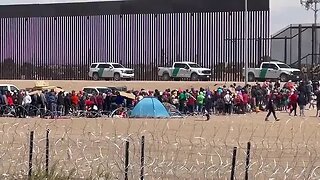 Hundreds of migrants continue to cross illegally into El Paso...